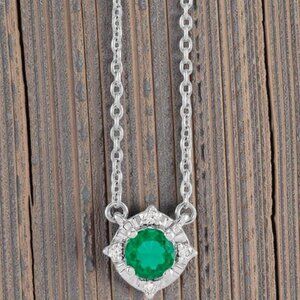 Lab Created Emerald and Diamond Halo Pendant in 925 Sterling Silver